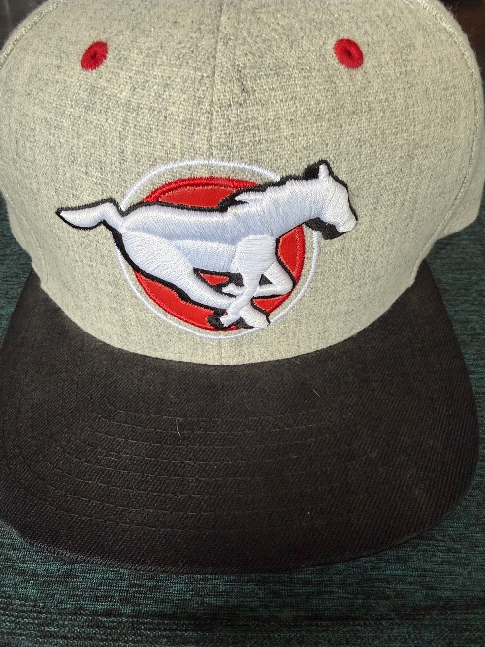 Gray and Black Hat with Red Accents and Horse Patch
